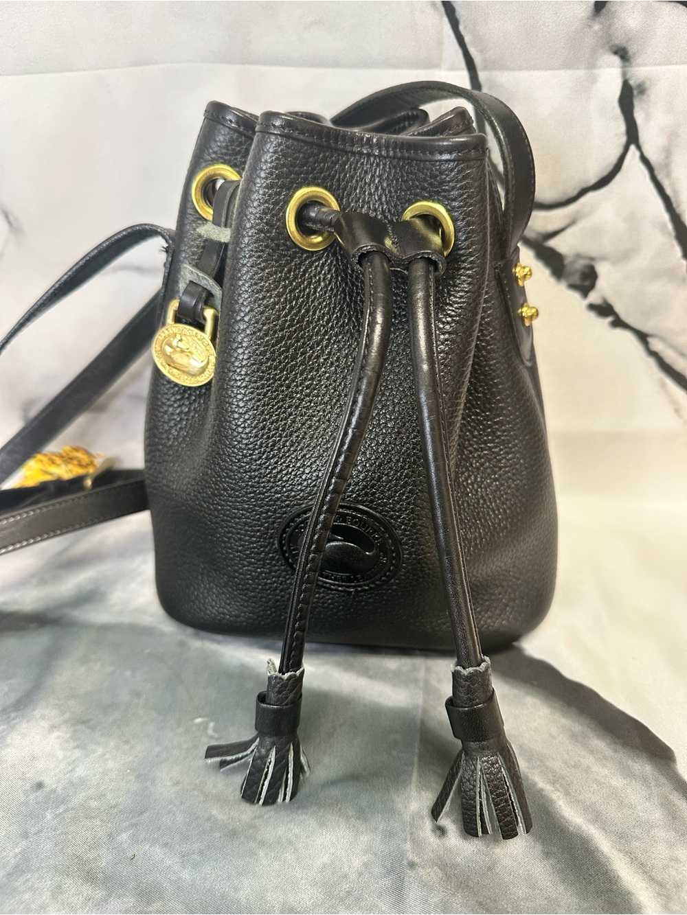 Dooney & Bourke Black Leather Drawstring Bucket Bag with Gold Hardware